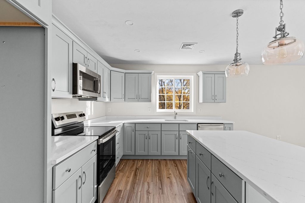 Interior, Kitchen, Pendant Lights, Recessed Lighting, Stainless Steel Appliances, Wood Texture Flooring