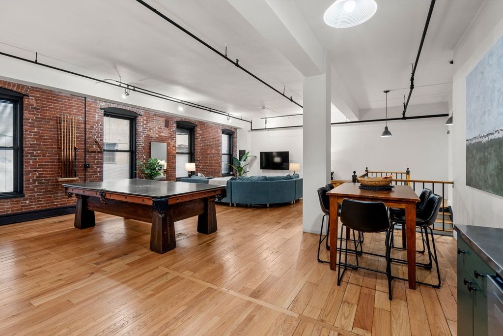 Billiard Table, Game Room, Interior, Living room, Pendant Lights, Stone Walls, Wood Texture Flooring