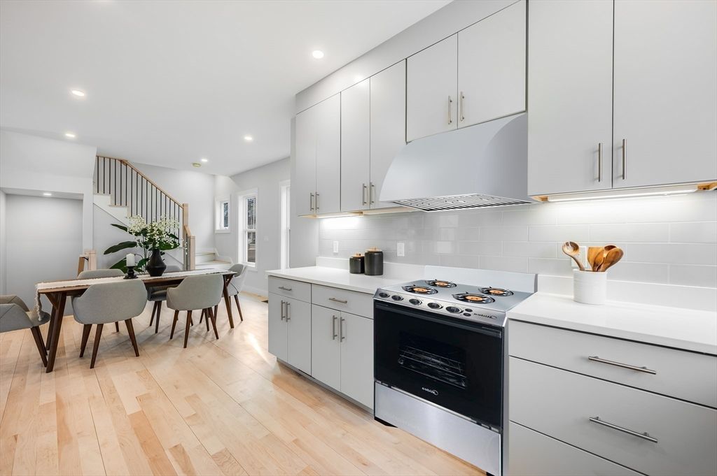 Dining room, Interior, Kitchen, Recessed Lighting, Stainless Steel Appliances, Wood Texture Flooring