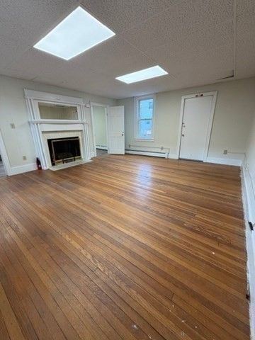 Empty room, Fireplace, Interior, Recessed Lighting, Wood Texture Flooring