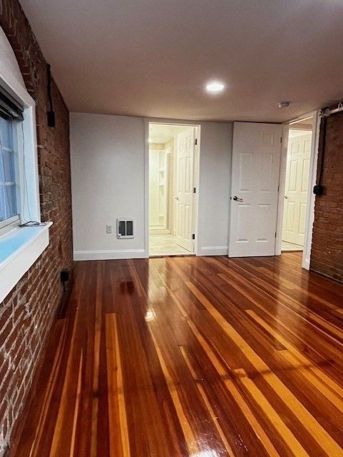 Empty room, Interior, Recessed Lighting, Stone Walls, Wood Texture Flooring