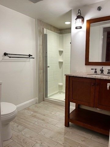 Bathroom, Glass Shower, Interior, Recessed Lighting, Wood Texture Flooring