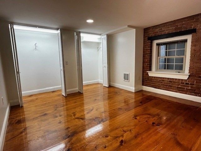 Empty room, Interior, Recessed Lighting, Stone Walls, Wood Texture Flooring