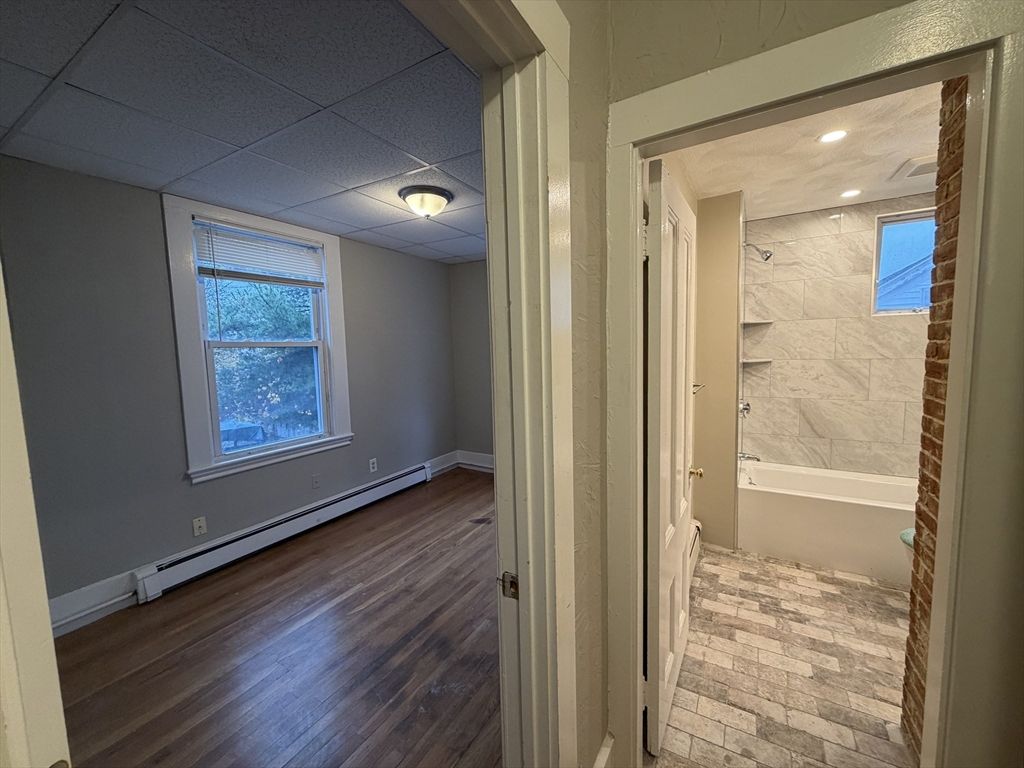 Bathroom, Interior, Marble Walls, Recessed Lighting, Wood Texture Flooring