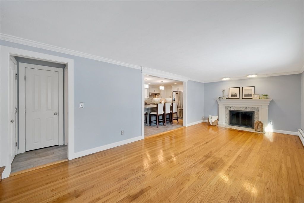 Dining room, Empty room, Fireplace, Interior, Kitchen, Pendant Lights, Recessed Lighting, Wood Texture Flooring
