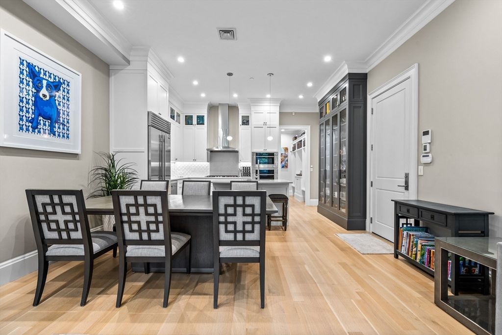 Dining room, Interior, Kitchen, Pendant Lights, Recessed Lighting, Stainless Steel Appliances, Wood Texture Flooring