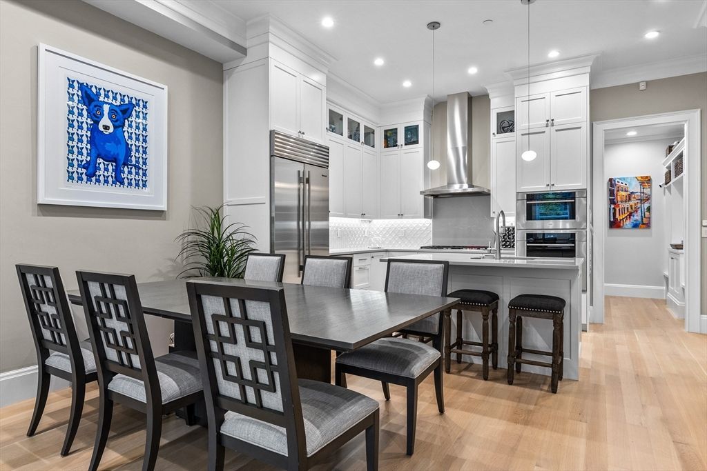 Dining room, Interior, Kitchen, Pendant Lights, Recessed Lighting, Stainless Steel Appliances, Wood Texture Flooring