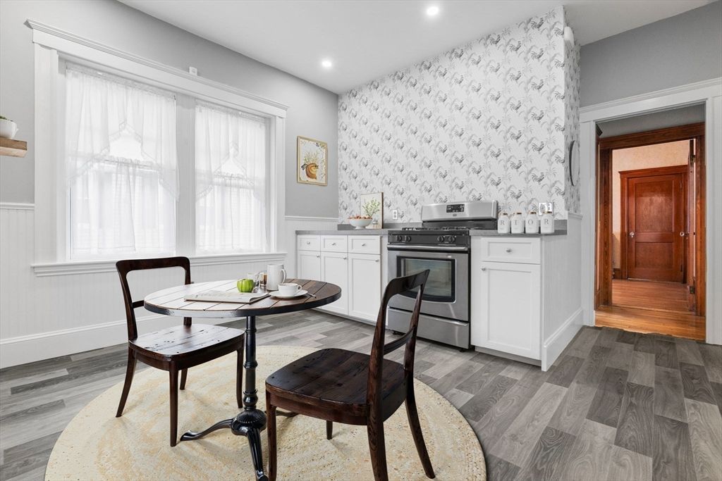 Dining room, Interior, Kitchen, Recessed Lighting, Stainless Steel Appliances, Wood Texture Flooring