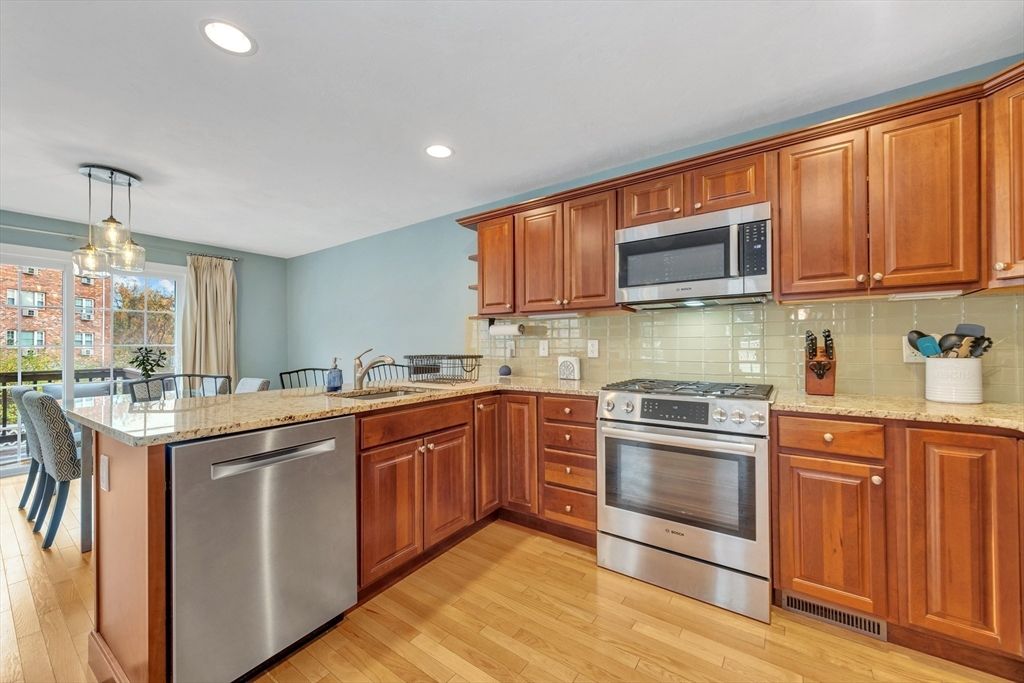 Interior, Kitchen, Pendant Lights, Recessed Lighting, Stainless Steel Appliances, Wood Texture Flooring