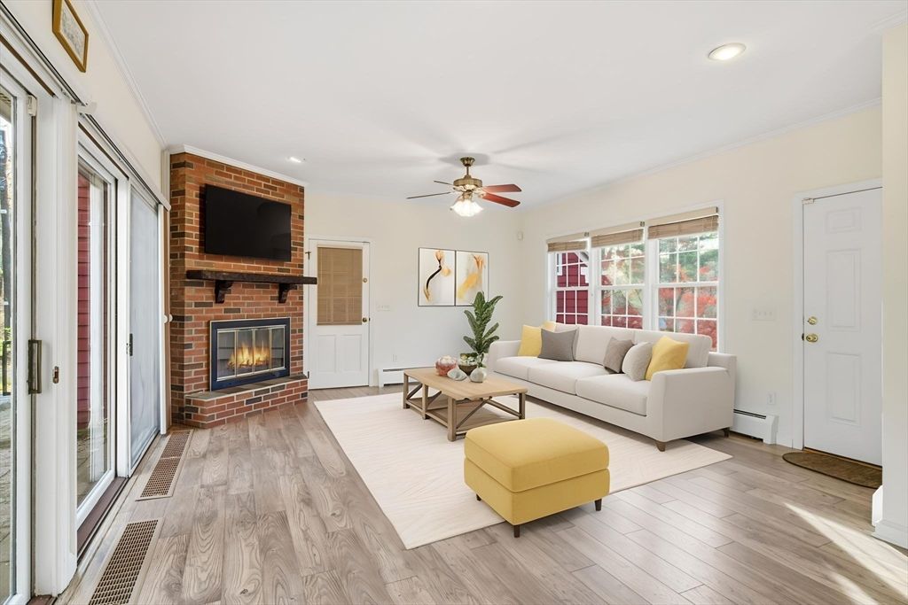 Fireplace, Interior, Living room, Recessed Lighting, Stone Walls, Wood Texture Flooring