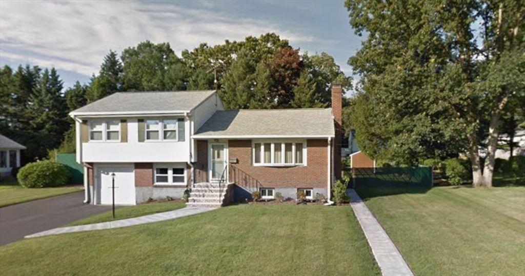 Attached, Backyard, Exterior, Facade, Brick Facade, Split Level