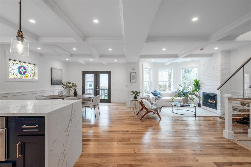 Dining room, Fireplace, Interior, Living room, Pendant Lights, Recessed Lighting, Wood Texture Flooring