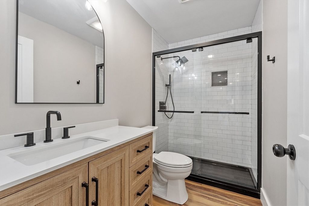 Bathroom, Dual Sink Vanities, Glass Shower, Interior, Wood Texture Flooring