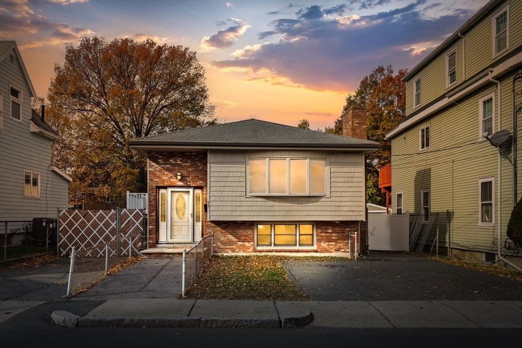 Exterior, Facade, Brick Facade, Raised Ranch