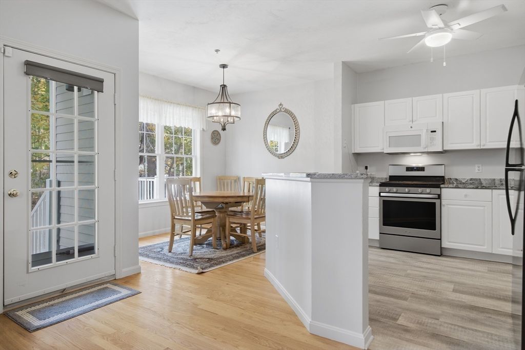 Dining room, Interior, Kitchen, Pendant Lights, Stainless Steel Appliances, Wood Texture Flooring