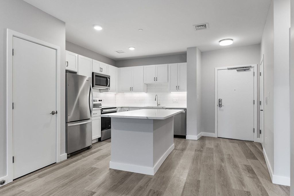 Interior, Kitchen, Recessed Lighting, Stainless Steel Appliances, Wood Texture Flooring