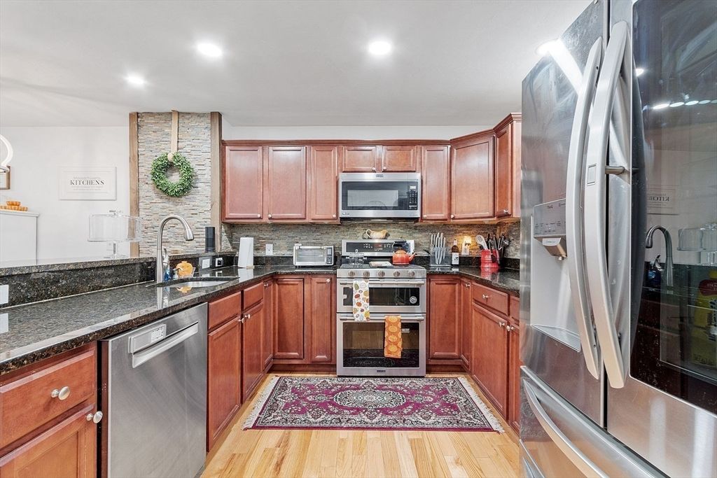 Interior, Kitchen, Recessed Lighting, Stainless Steel Appliances, Stone Walls, Wood Texture Flooring