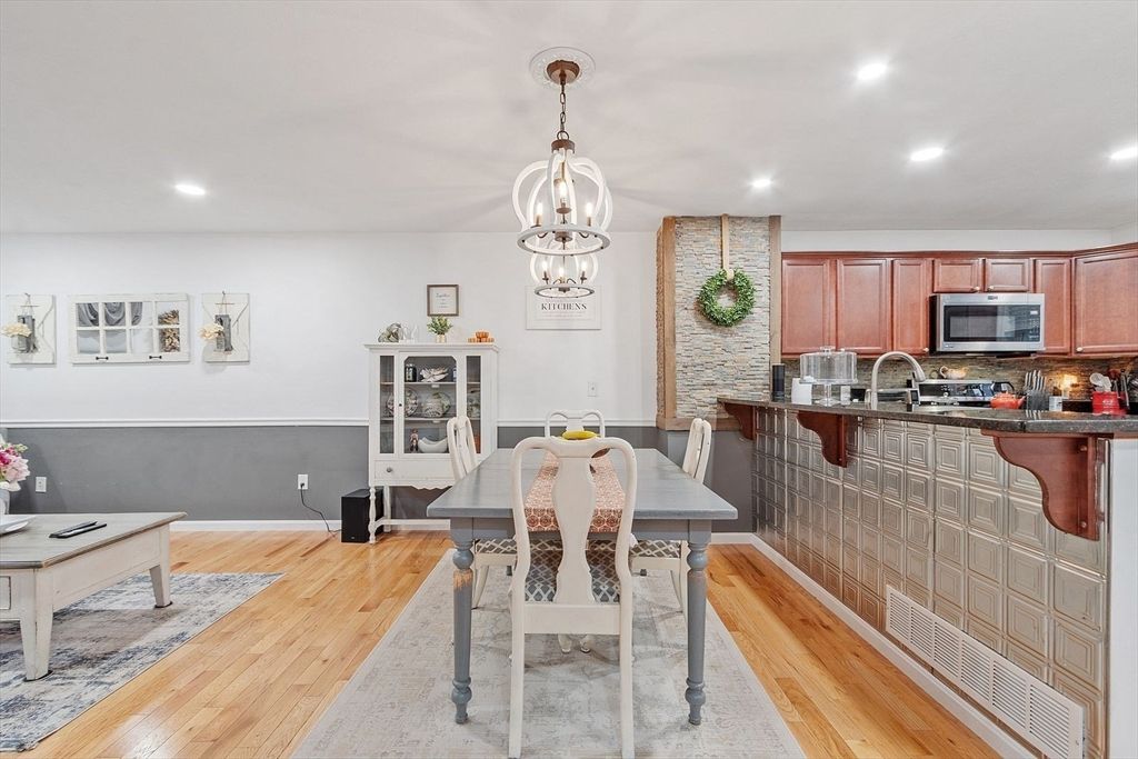 Dining room, Interior, Kitchen, Pendant Lights, Recessed Lighting, Stainless Steel Appliances, Wood Texture Flooring