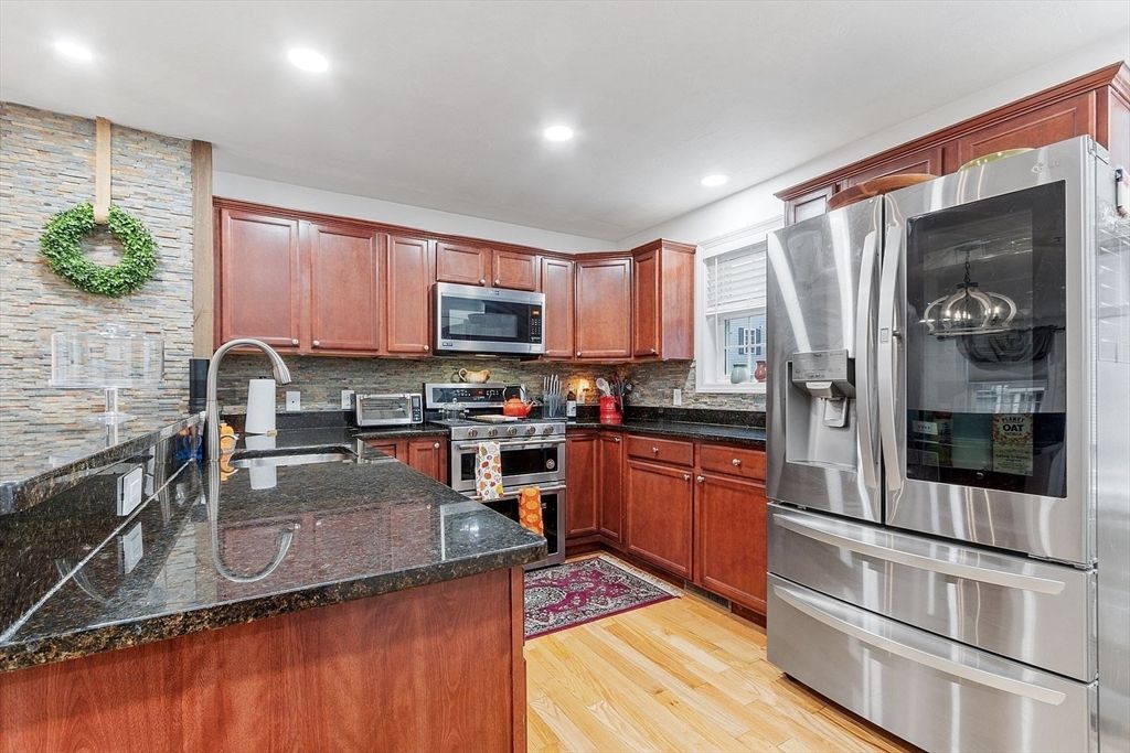 Interior, Kitchen, Recessed Lighting, Stainless Steel Appliances, Stone Walls, Wood Texture Flooring