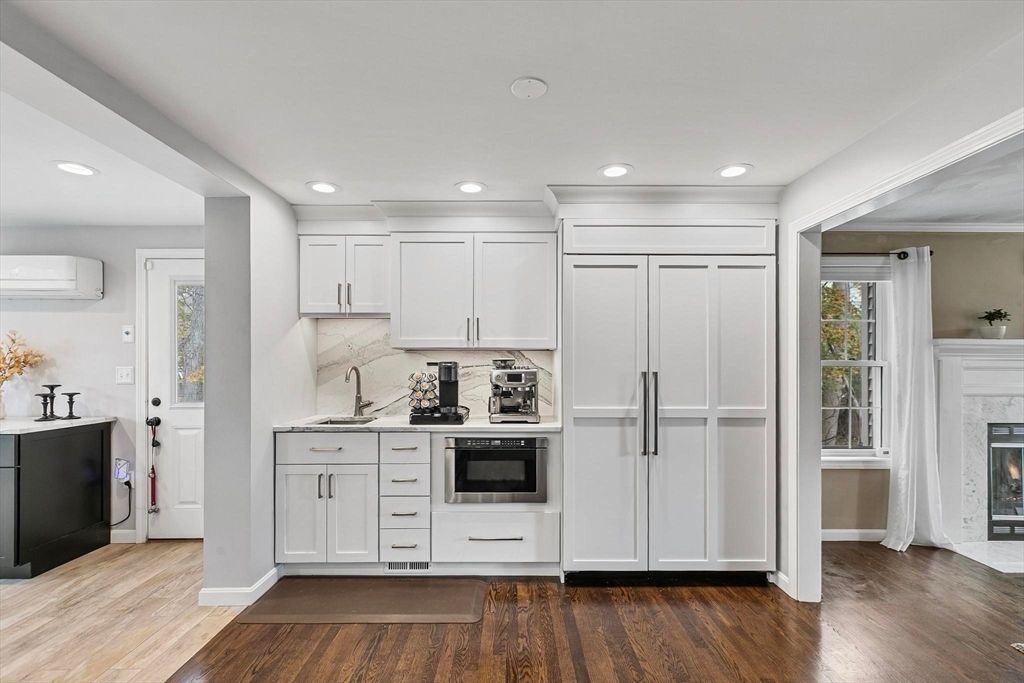 Fireplace, Interior, Kitchen, Recessed Lighting, Wood Texture Flooring