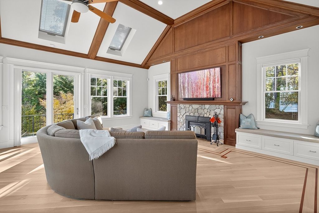 Fireplace, Interior, Living room, Recessed Lighting, Sun Room, Wood Texture Flooring, Wooden Walls