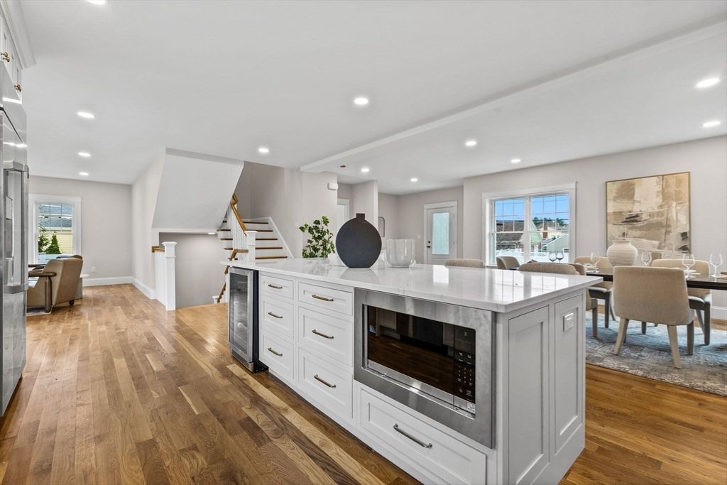 Dining room, Interior, Kitchen, Recessed Lighting, Stainless Steel Appliances, Wood Texture Flooring
