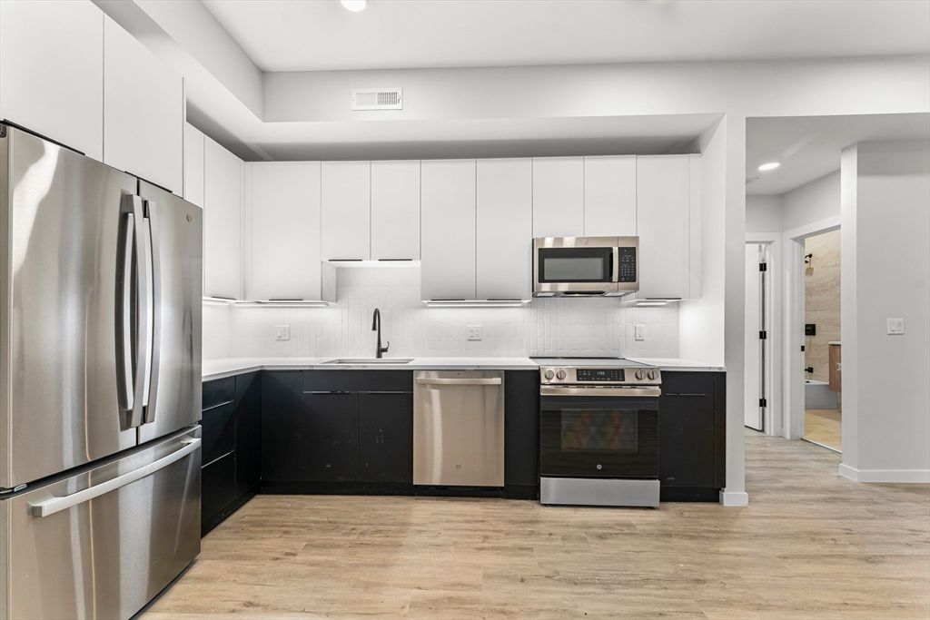 Interior, Kitchen, Recessed Lighting, Stainless Steel Appliances, Wood Texture Flooring