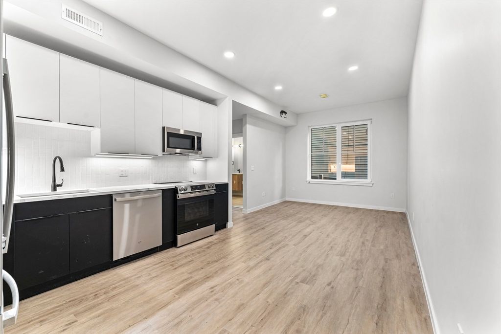 Interior, Kitchen, Recessed Lighting, Stainless Steel Appliances, Wood Texture Flooring