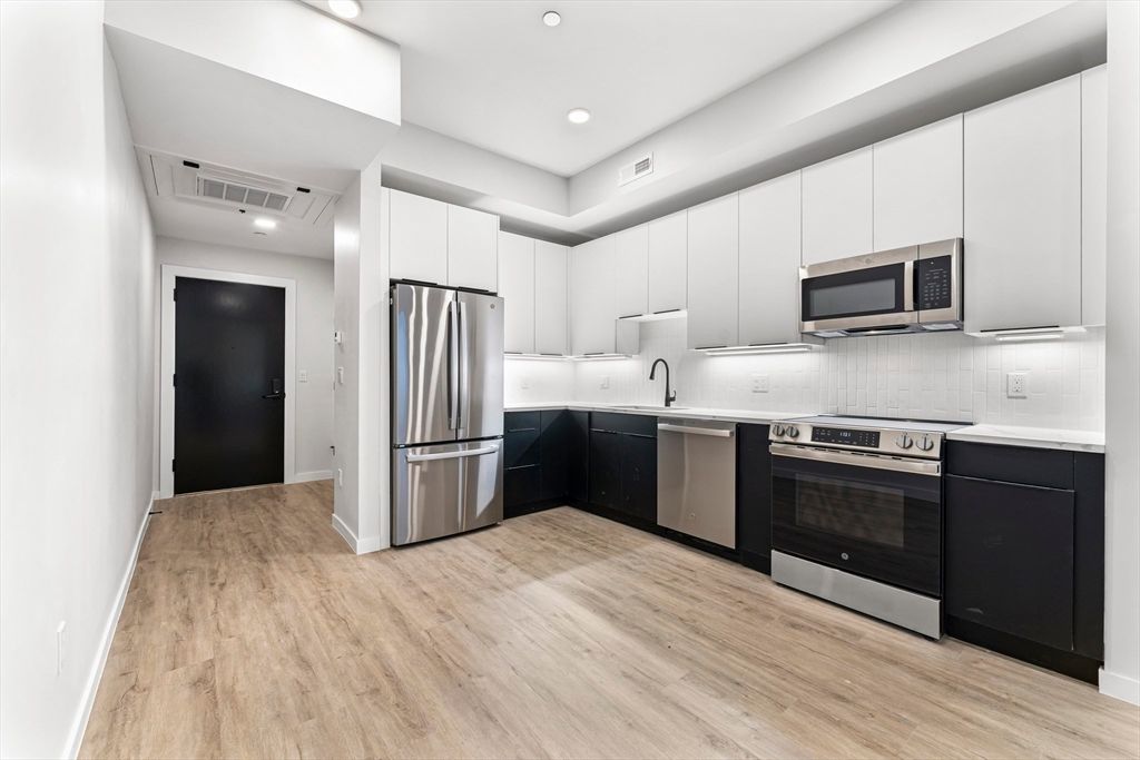 Interior, Kitchen, Recessed Lighting, Stainless Steel Appliances, Wood Texture Flooring