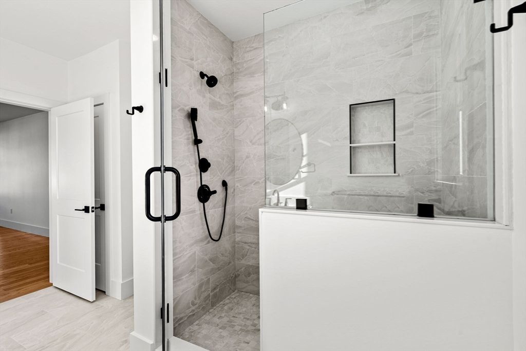 Bathroom, Glass Shower, Interior, Marble Walls, Wood Texture Flooring