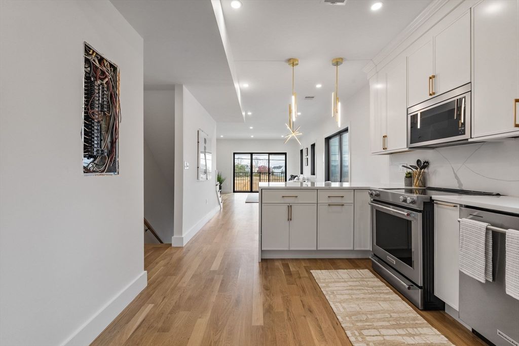 Interior, Kitchen, Pendant Lights, Recessed Lighting, Stainless Steel Appliances, Wood Texture Flooring