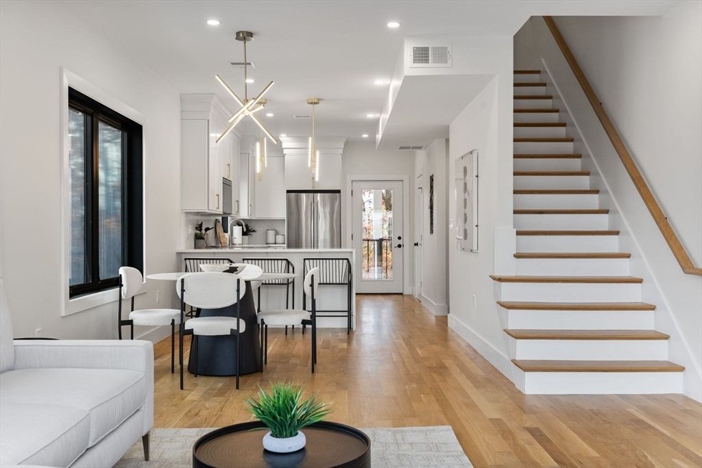 Dining room, Interior, Kitchen, Pendant Lights, Recessed Lighting, Stainless Steel Appliances, Wood Texture Flooring