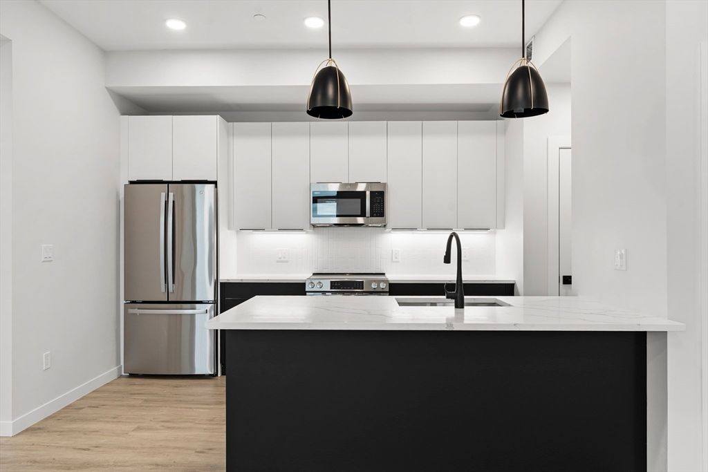 Interior, Kitchen, Pendant Lights, Recessed Lighting, Stainless Steel Appliances, Wood Texture Flooring