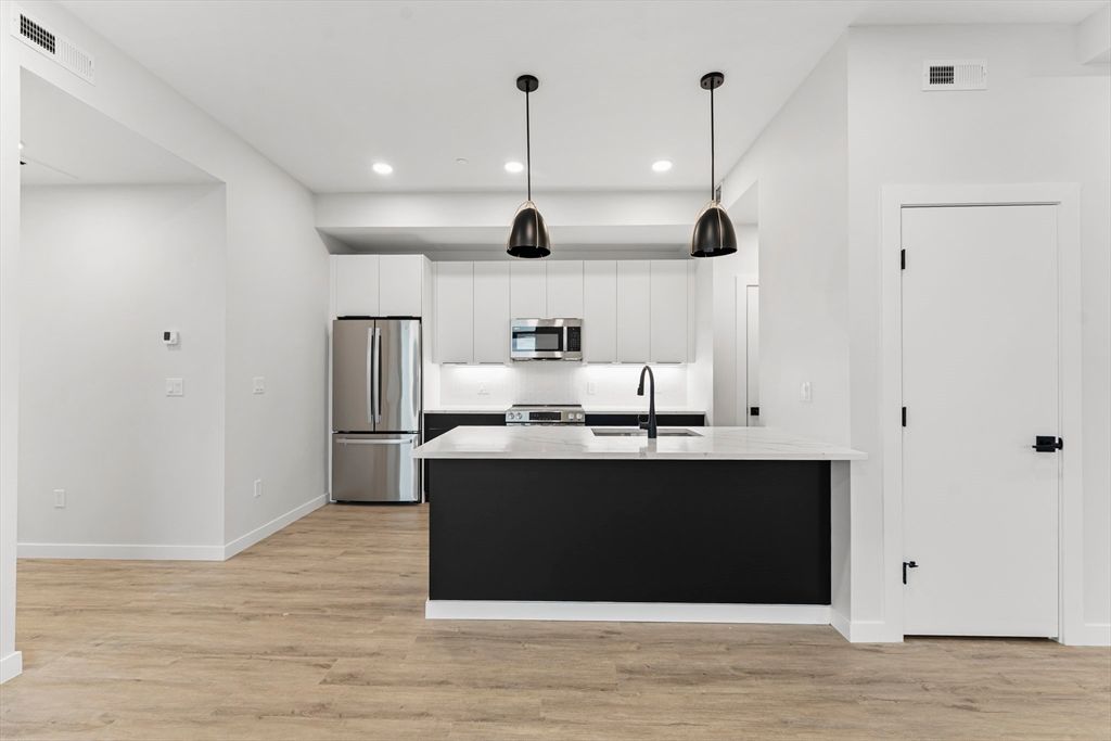 Interior, Kitchen, Pendant Lights, Recessed Lighting, Stainless Steel Appliances, Wood Texture Flooring