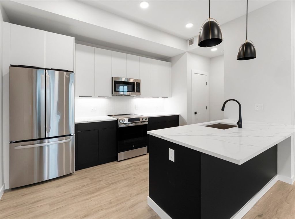 Interior, Kitchen, Pendant Lights, Recessed Lighting, Stainless Steel Appliances, Wood Texture Flooring