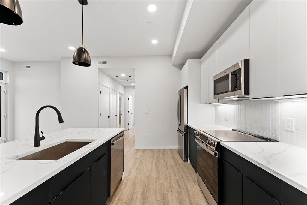 Interior, Kitchen, Pendant Lights, Recessed Lighting, Stainless Steel Appliances, Wood Texture Flooring