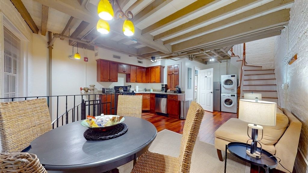 Dining room, Interior, Kitchen, Pendant Lights, Stainless Steel Appliances, Washer, Wood Texture Flooring