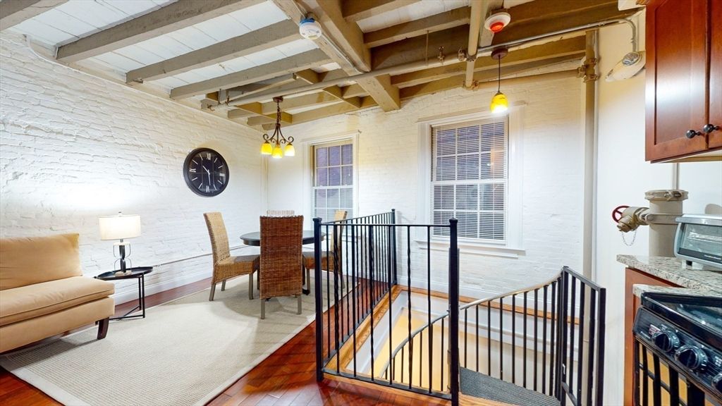 Dining room, Interior, Pendant Lights, Stone Walls, Wooden Beams, Wood Texture Flooring