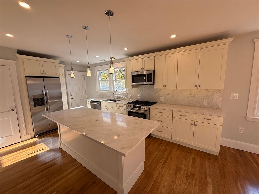 Interior, Kitchen, Pendant Lights, Recessed Lighting, Stainless Steel Appliances, Wood Texture Flooring