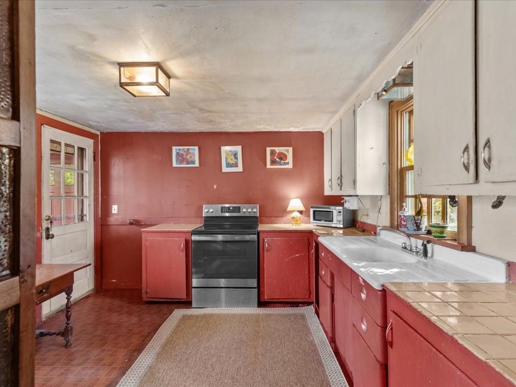 Interior, Kitchen, Tile Countertops, Wood Texture Flooring