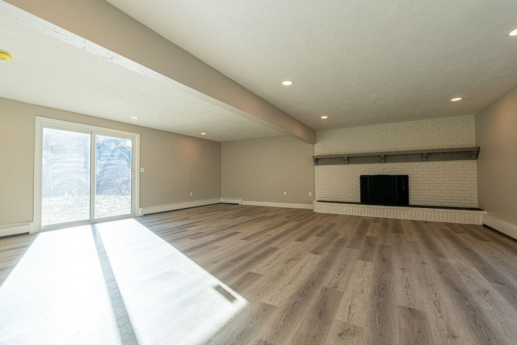 Empty room, Fireplace, Interior, Recessed Lighting, Wood Texture Flooring