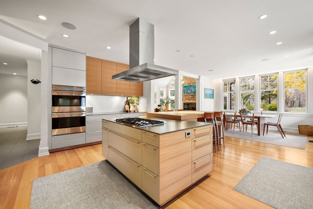 Dining room, Fireplace, Interior, Kitchen, Recessed Lighting, Stainless Steel Appliances, Wood Texture Flooring