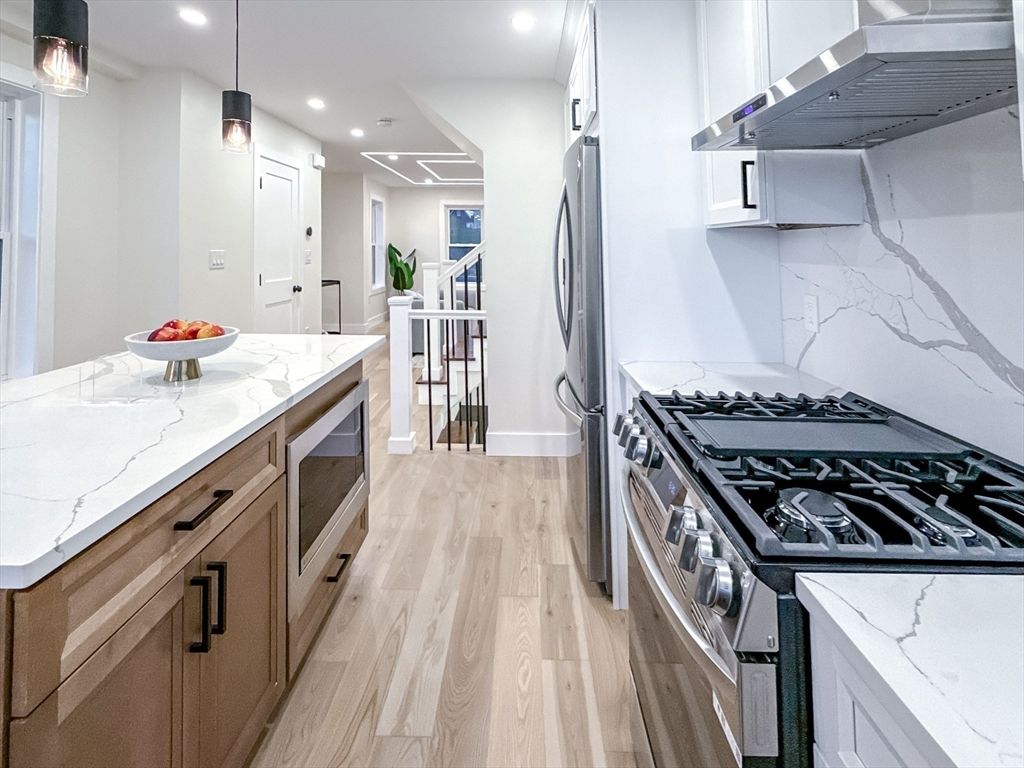 Interior, Kitchen, Pendant Lights, Recessed Lighting, Stainless Steel Appliances, Wood Texture Flooring