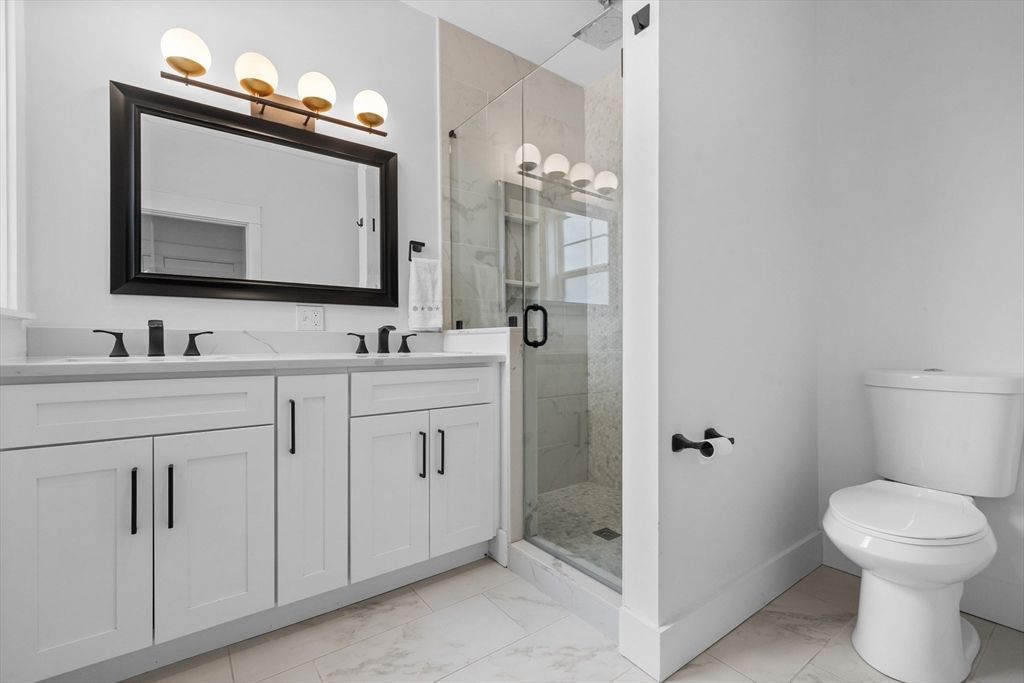 Bathroom, Dual Sink Vanities, Glass Shower, Interior, Marble, Marble Walls