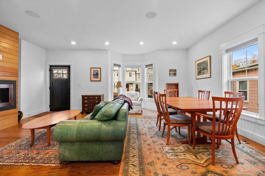 Dining room, Fireplace, Interior, Living room, Recessed Lighting, Wood Texture Flooring