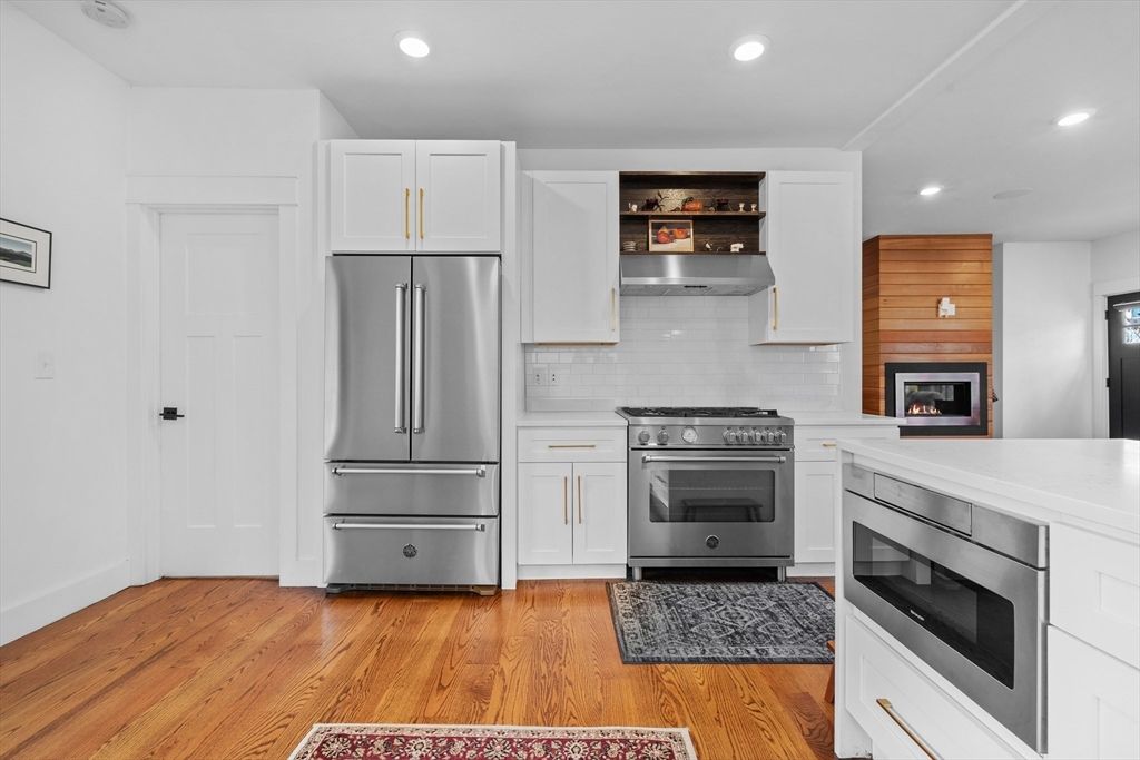 Interior, Kitchen, Recessed Lighting, Stainless Steel Appliances, Wood Texture Flooring, Wooden Walls