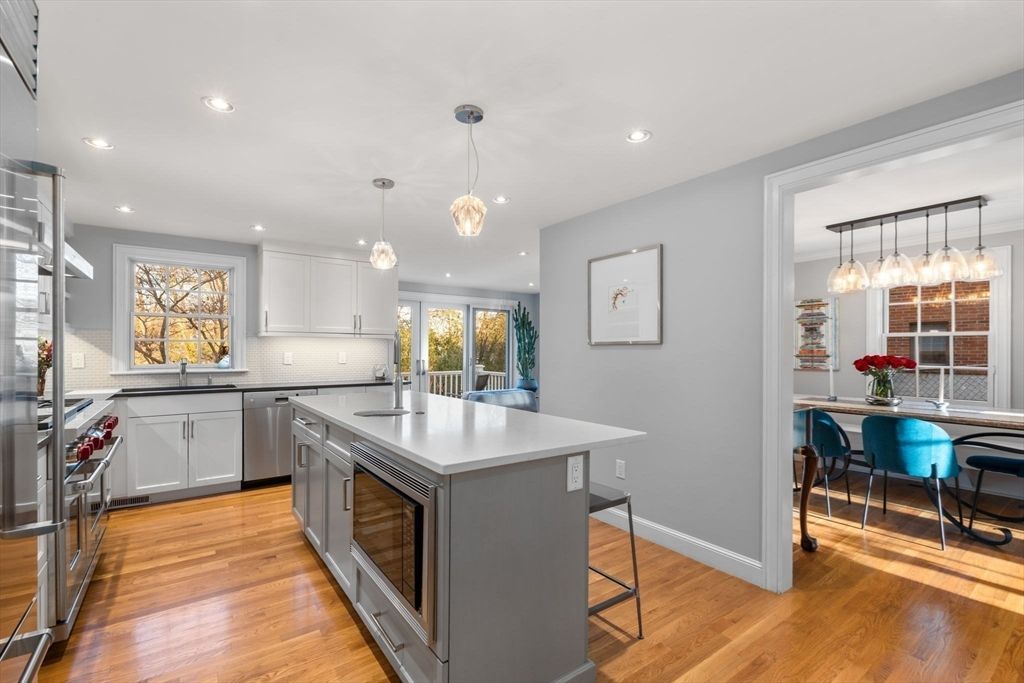 Dining room, Interior, Kitchen, Pendant Lights, Recessed Lighting, Stainless Steel Appliances, Wood Texture Flooring