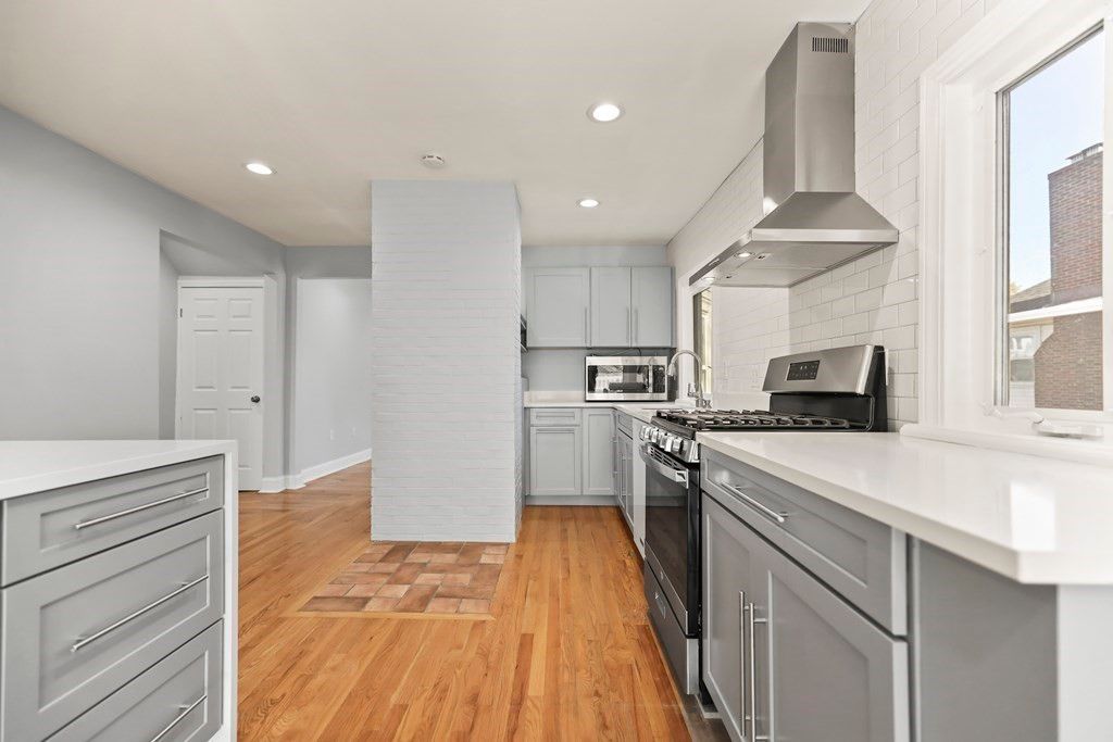 Interior, Kitchen, Recessed Lighting, Stainless Steel Appliances, Wood Texture Flooring