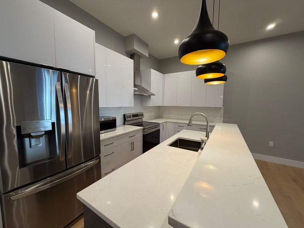 Interior, Kitchen, Pendant Lights, Recessed Lighting, Stainless Steel Appliances, Wood Texture Flooring
