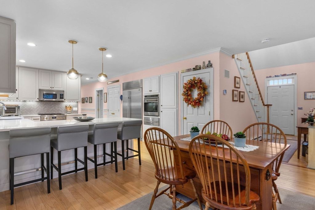 Dining room, Interior, Kitchen, Pendant Lights, Recessed Lighting, Stainless Steel Appliances, Wood Texture Flooring